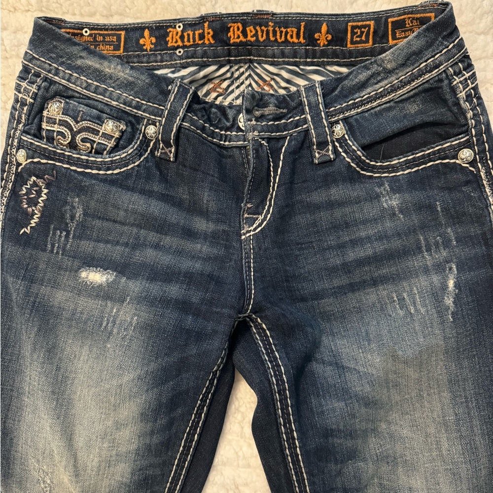 Rock Revival Dark Blue Easy Boot Kai jeans. Size 27 Rise 9” Inseam 32.5”